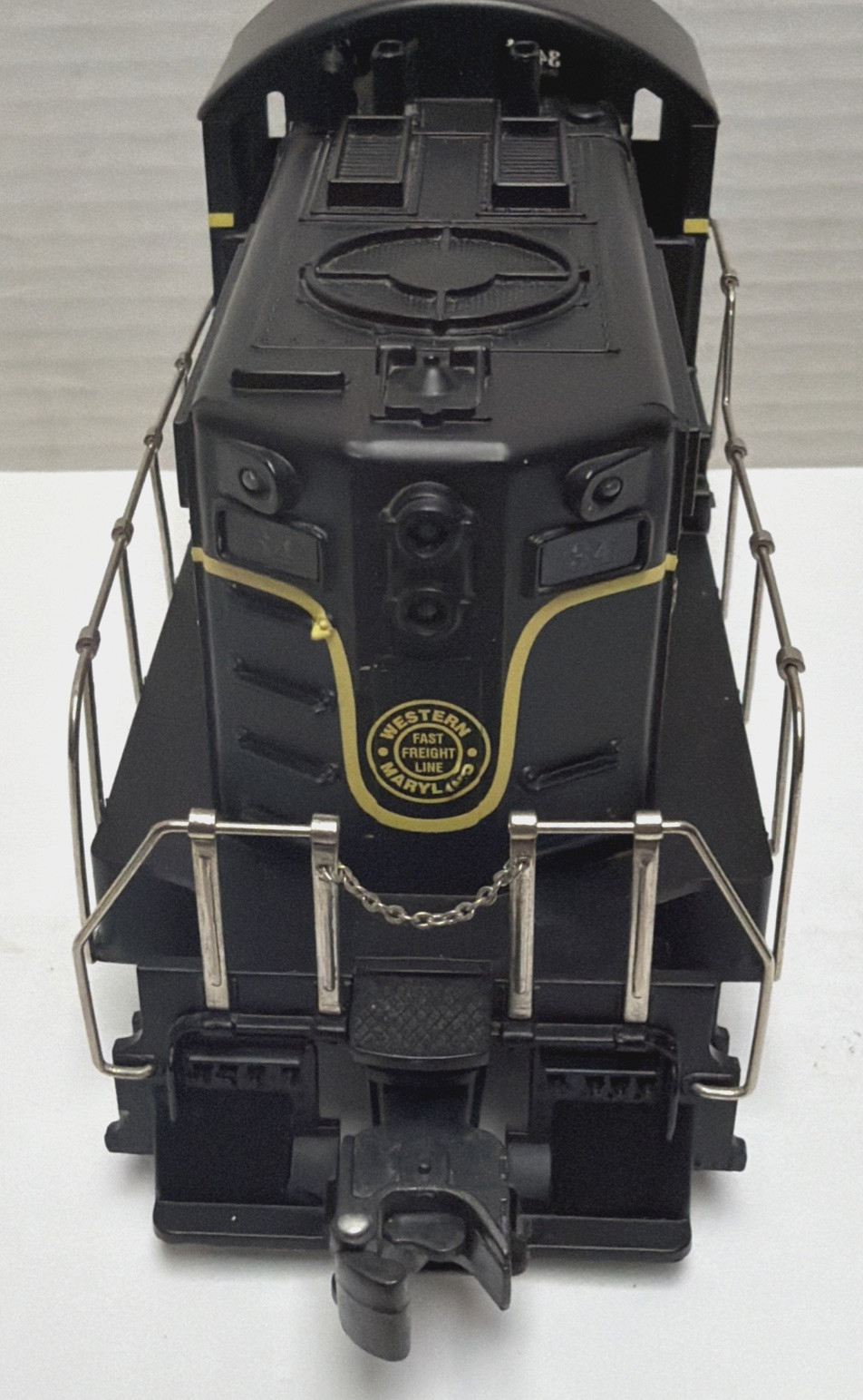 RMT-4342 WESTERN MARYLAND #34 BEEP POWERED DIESEL LOCOMOTIVE O/027. NO BOX.