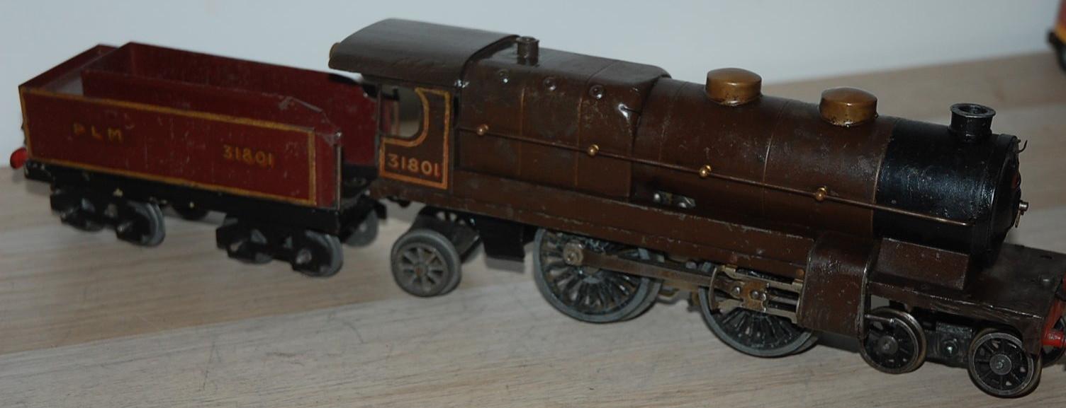 HORNBY O GAUGE CLOCKWORK ‘NORD’ LOCOMOTIVE AND TENDER IN BROWN LIVERY