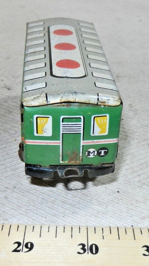 Older Tin Lithographed MT 4 Passenger Coach with plastic wheels – by who?
