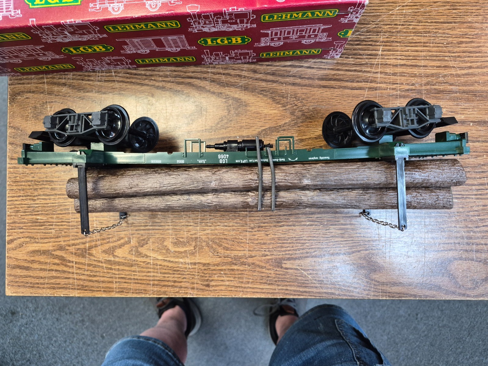 LGB 4066 LOG CAR WITH LOGS, STAKES, CHAINS , SPRING TIE DOWNS G SCALE PRE OWNED