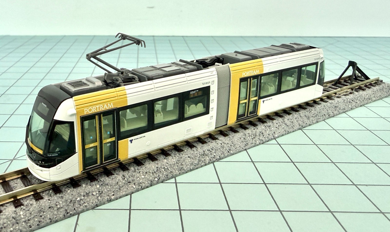Kato 14-801-6 Toyama Light Rail Tram Portram TLR0603 (White and Yellow)