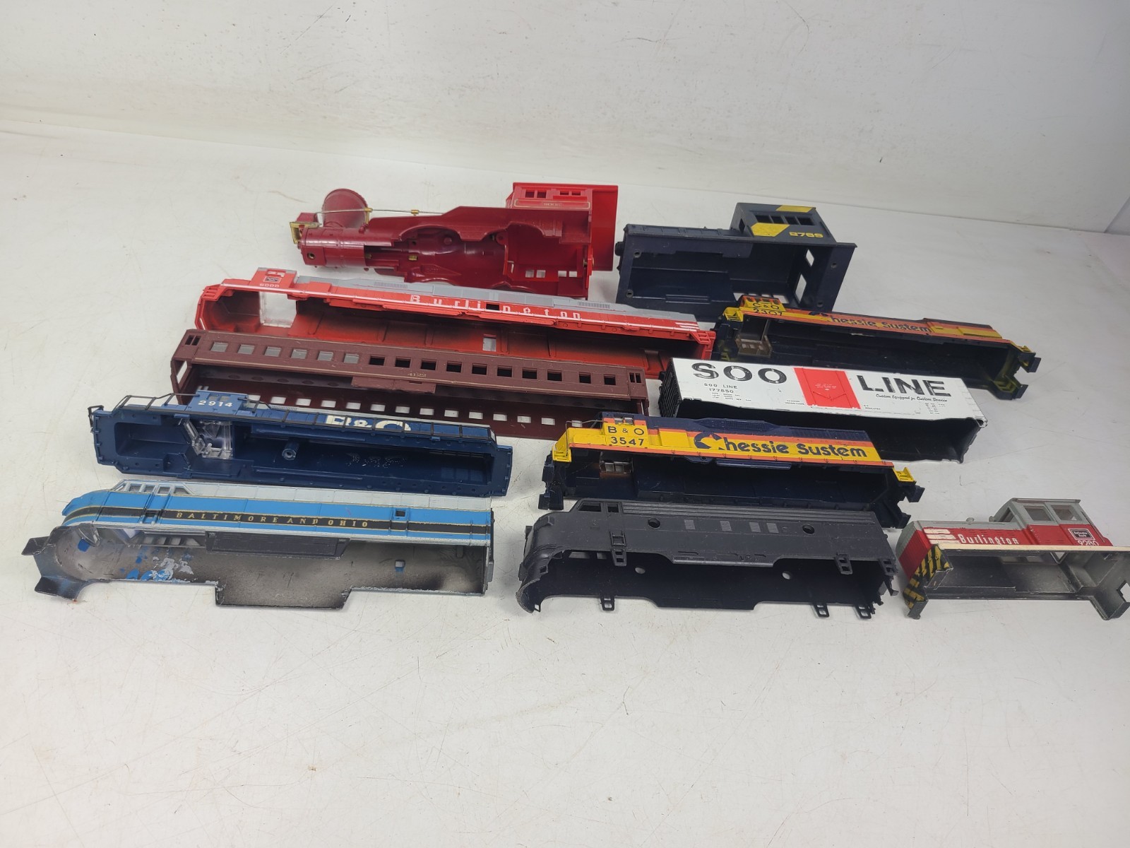 VINTAGE MIXED LOT OF 11 HO SCALE LOCOMOTIVE TRAIN SHELLS ONLY