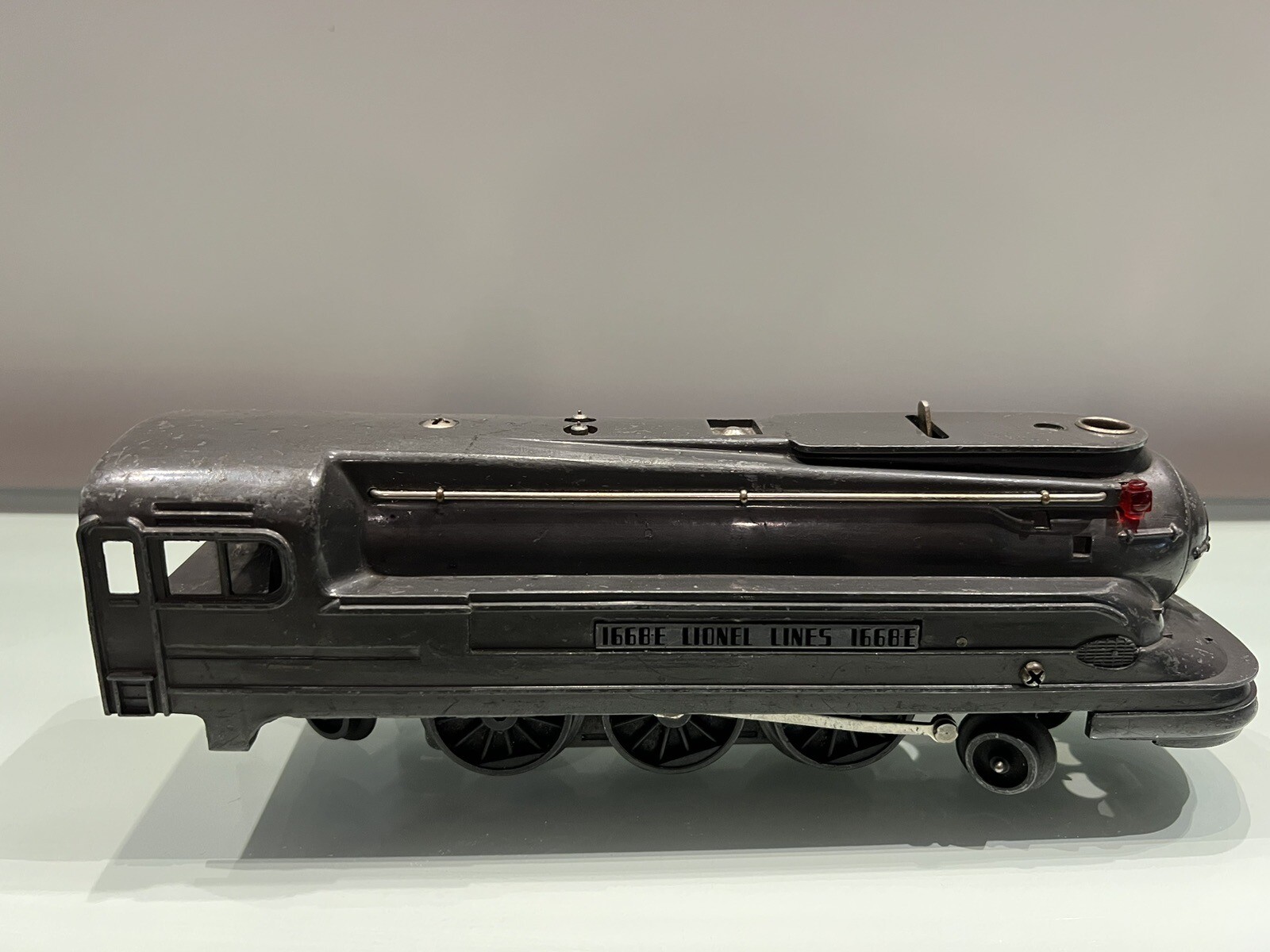 Lionel 1668E Streamlined Torpedo Steam Locomotive. Gunmetal Color. Runs well.