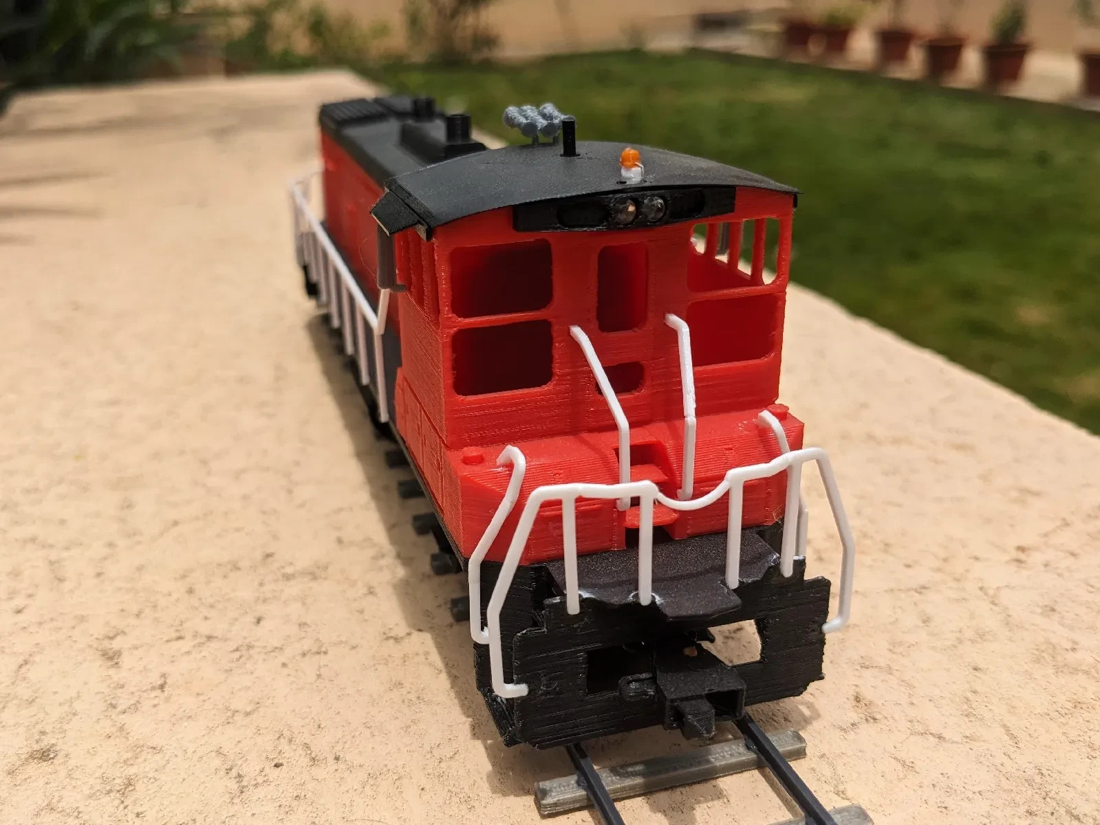 S‑Scale MP15AC Locomotive – Strong Plastic Model w/ Auto Coupler & Bogies