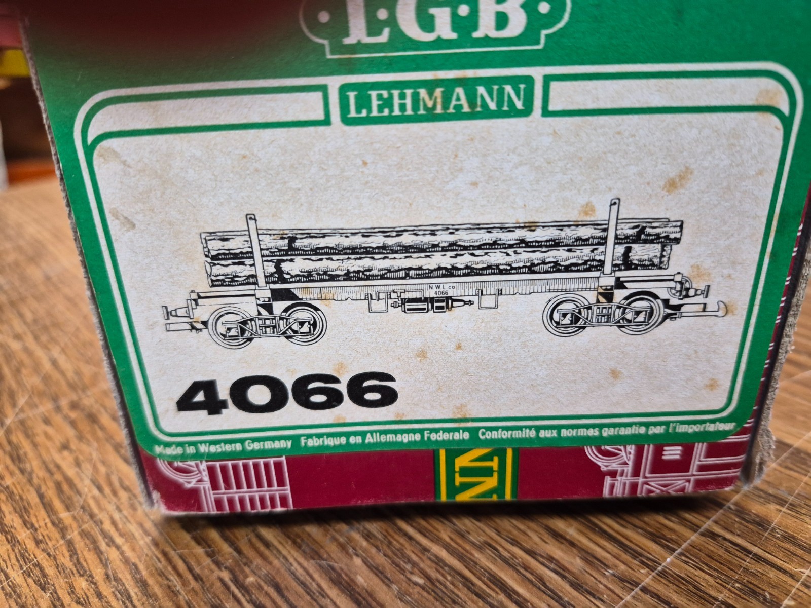 LGB 4066 LOG CAR WITH LOGS, STAKES, CHAINS , SPRING TIE DOWNS G SCALE PRE OWNED