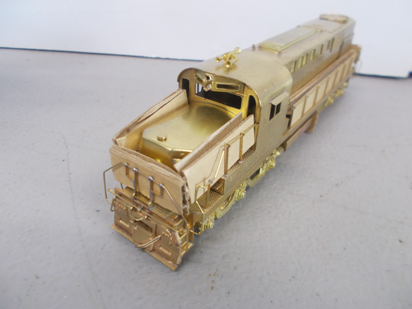ALCO # D-124L ~ BRASS~ DL-702 POWERED LOCOMOTIVE ~NOS-RUNS GOOD~HO SCALE~LOT-B