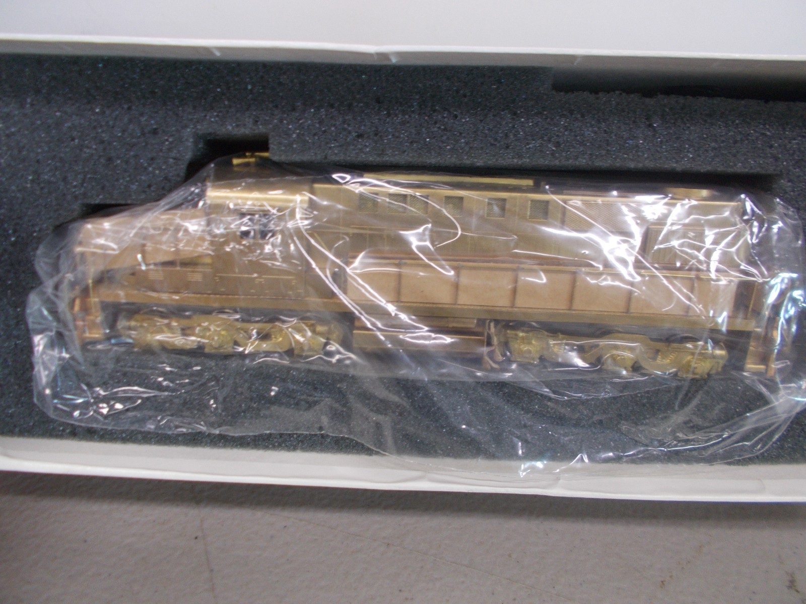 ALCO # D-124L ~ BRASS~ DL-702 POWERED LOCOMOTIVE ~NOS-RUNS GOOD~HO SCALE~LOT-B