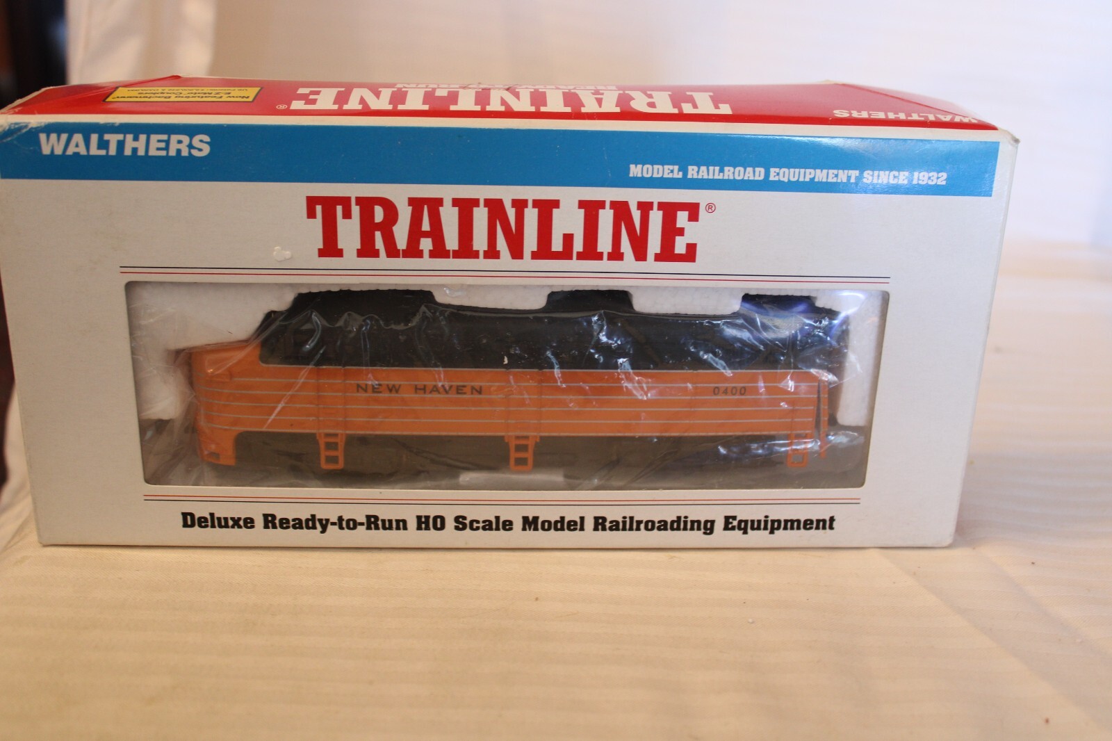HO Scale Walthers, Alco FA-1 Diesel Locomotive, New Haven Orange #0400 – 931-223
