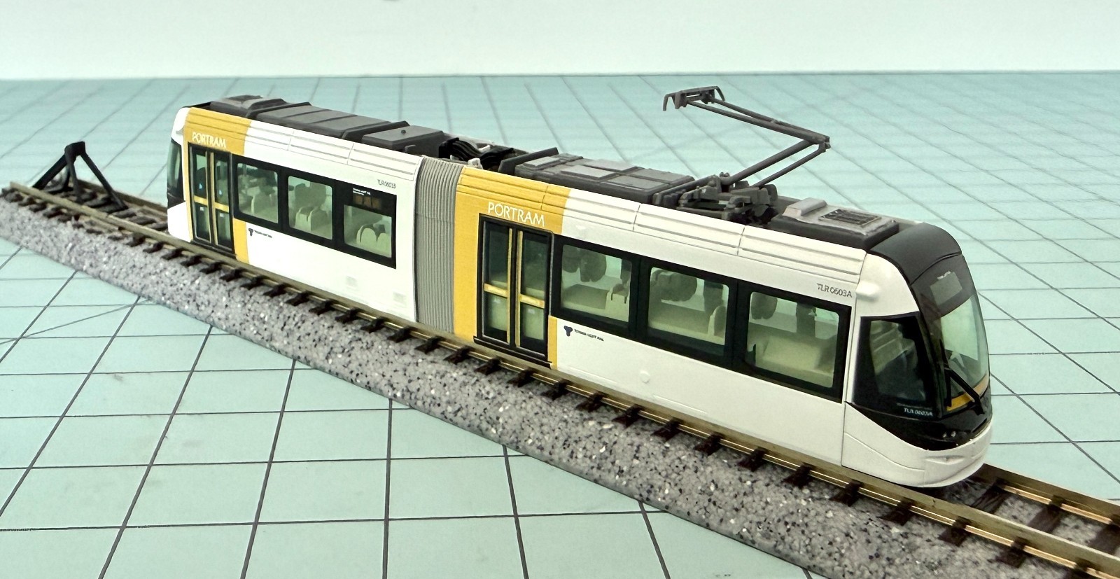 Kato 14-801-6 Toyama Light Rail Tram Portram TLR0603 (White and Yellow)