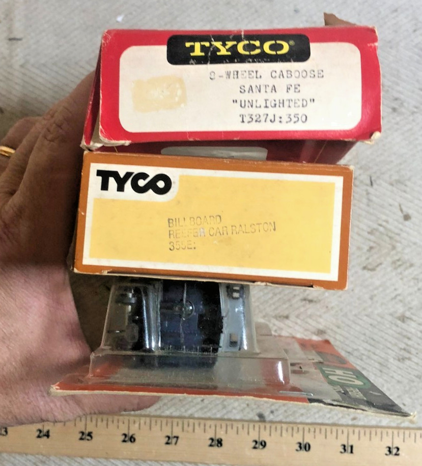 HO cabooses: 2 Tyco (Reading wide vision, AT&SF), one Life Like (B&O) (C)