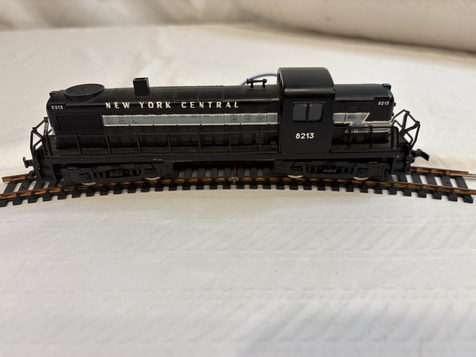 New York Central 8213 HO Locomotive RS-2 And Track Piece. Black. Tested