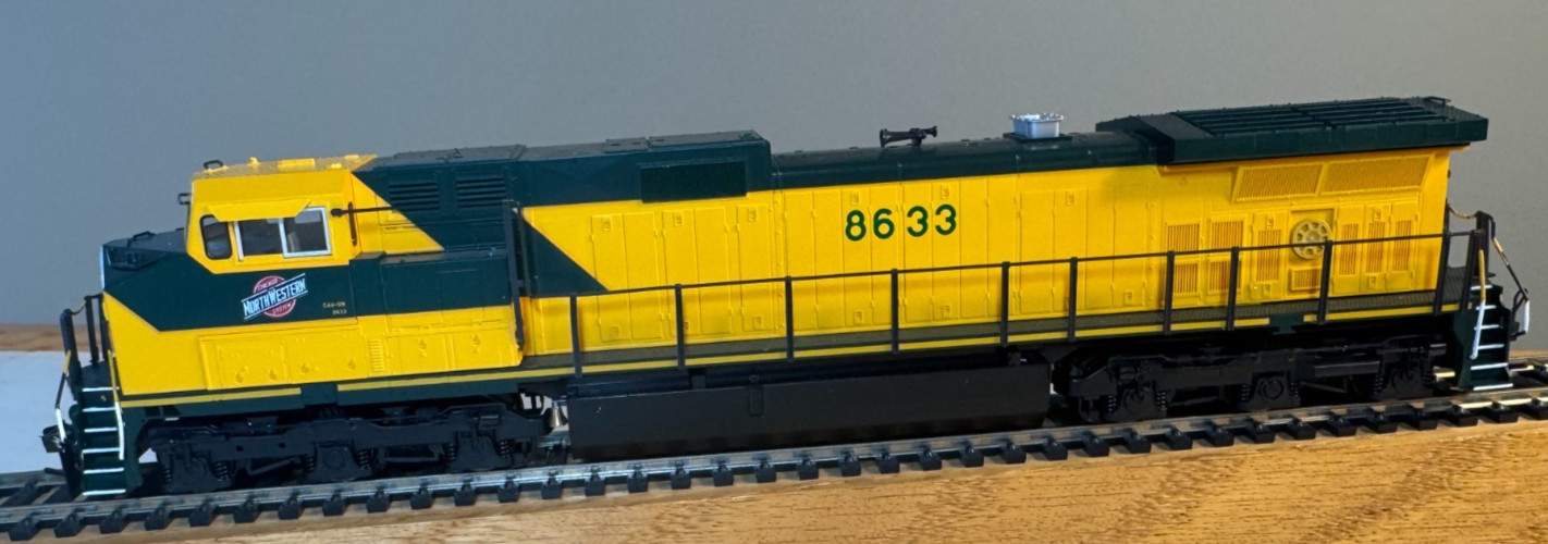 Set of 2 CNW Diesel Locomotives with DCC Control – EMD SD-7 & GE DAsh9-44CW