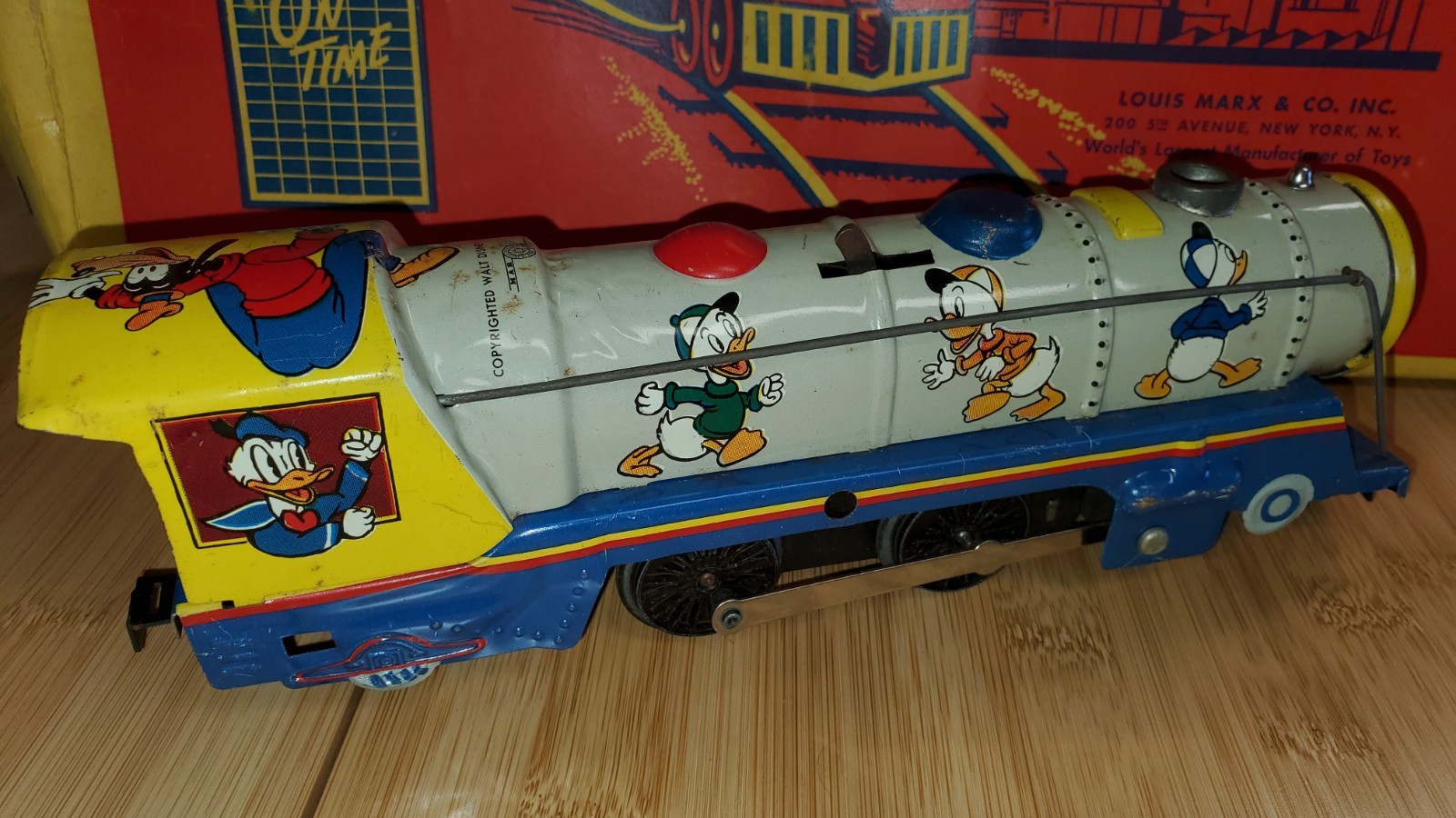 + Marx Walt Disney’s Mickey Mouse Meteor Mechanical Locomotive 4 Car Freight Set