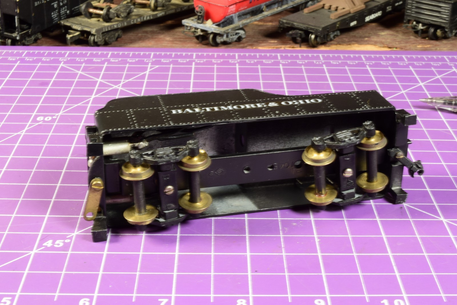 6.4 oz diecast Tender floating trucks, brass accents, fixed knuckle coupler