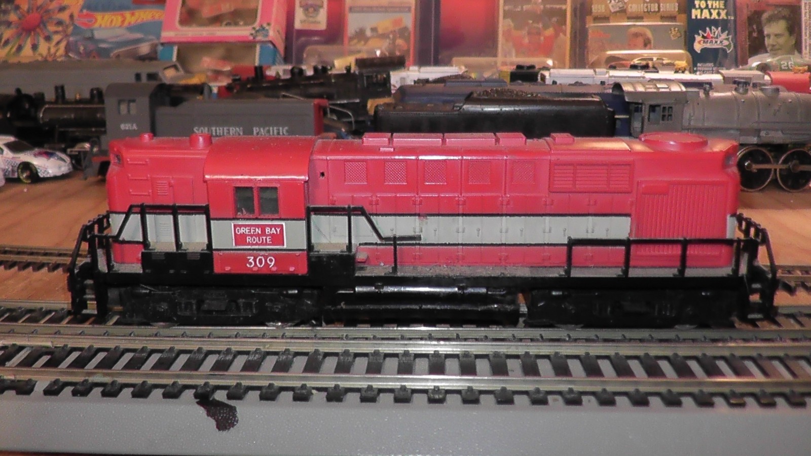 ho unbranded diesel locomotive green bay route runs on track