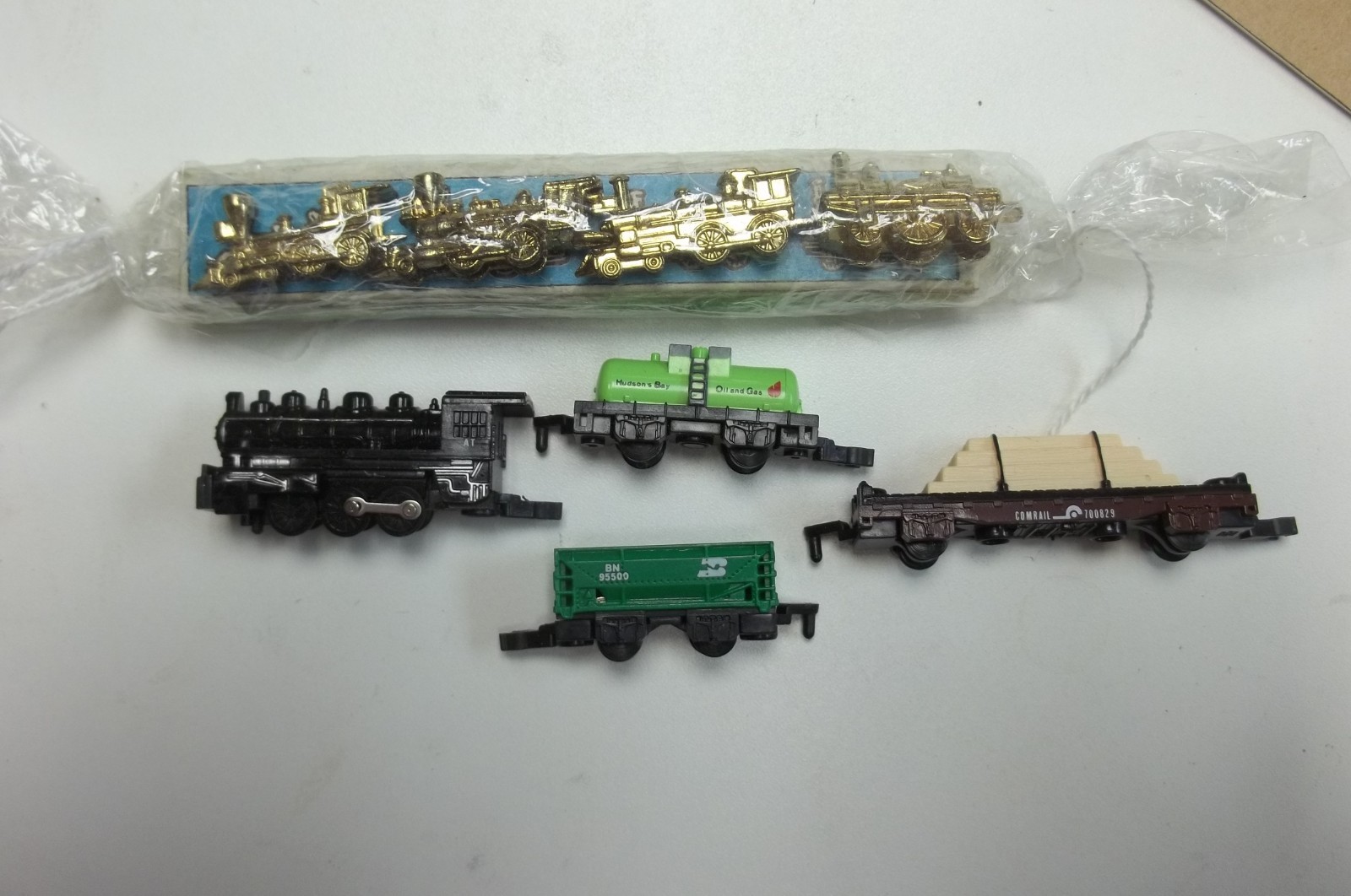 Steam locos and cars for display. Very small.