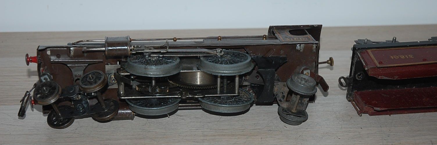 HORNBY O GAUGE CLOCKWORK ‘NORD’ LOCOMOTIVE AND TENDER IN BROWN LIVERY