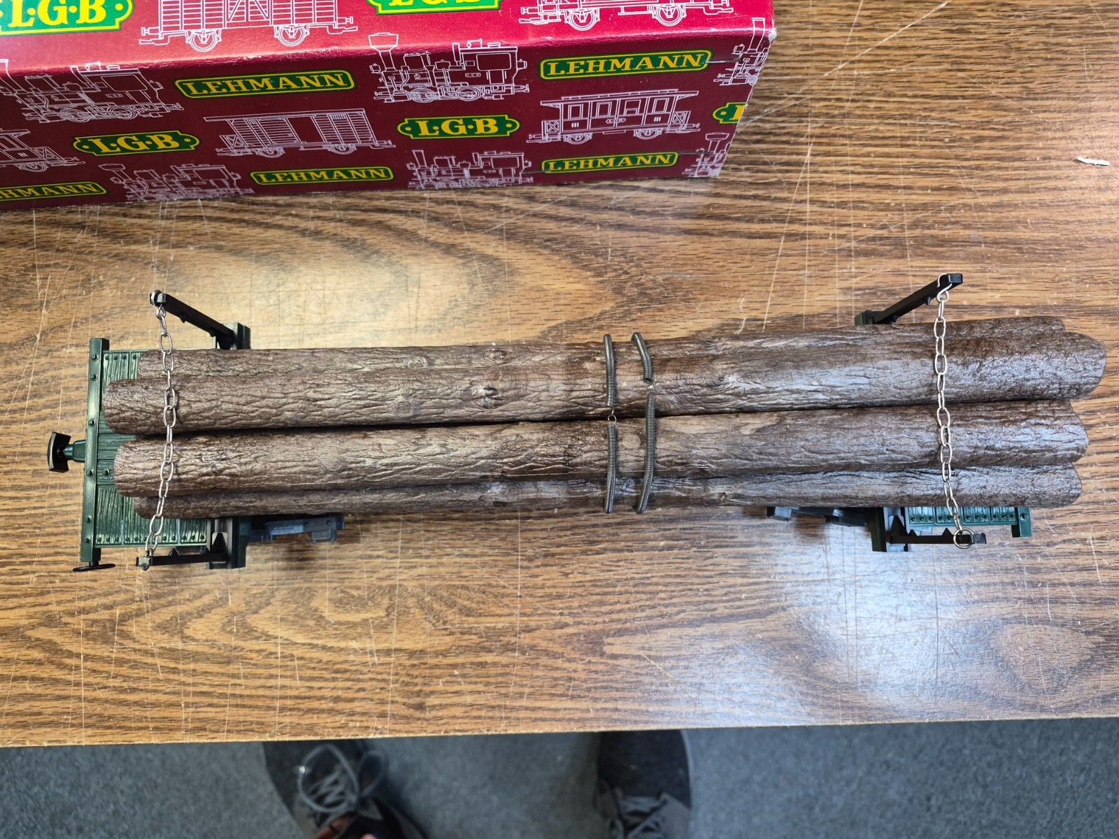 LGB 4066 LOG CAR WITH LOGS, STAKES, CHAINS , SPRING TIE DOWNS G SCALE PRE OWNED