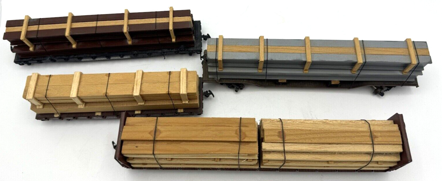 LOT OF 4 DIFFERENT HO GAUGE MODEL RAILROAD S P WOOD CARRIER CARS WITH LOADS
