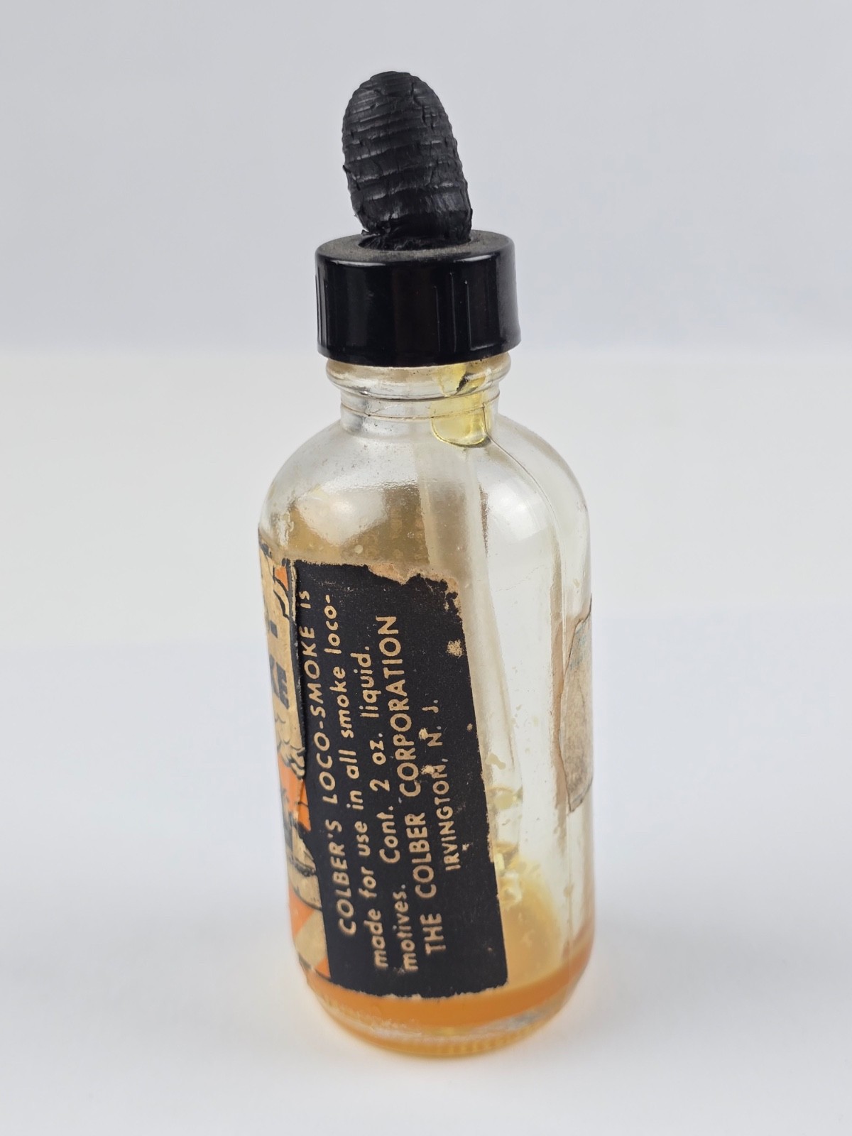 1950’s Colber’s Loco-Smoke Toy Train smoke liquid Empty Bottle paper label
