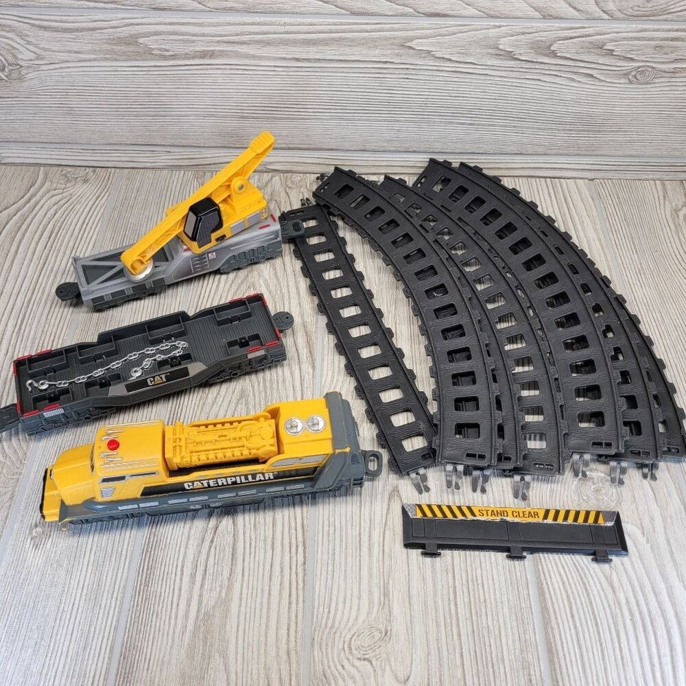 Toy State Caterpillar Construction Express Train Track Set Motorized Locomotive