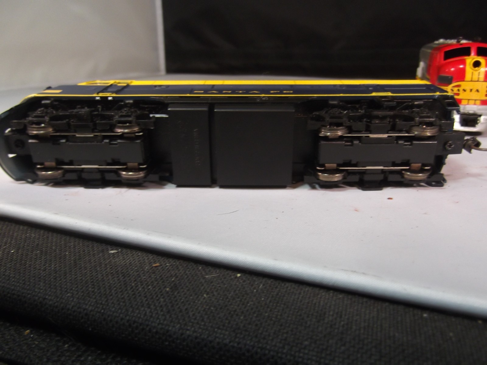 Lot of HO Scale Diesel Locomotive Lot of 2 + Box Cars and a Caboose as is
