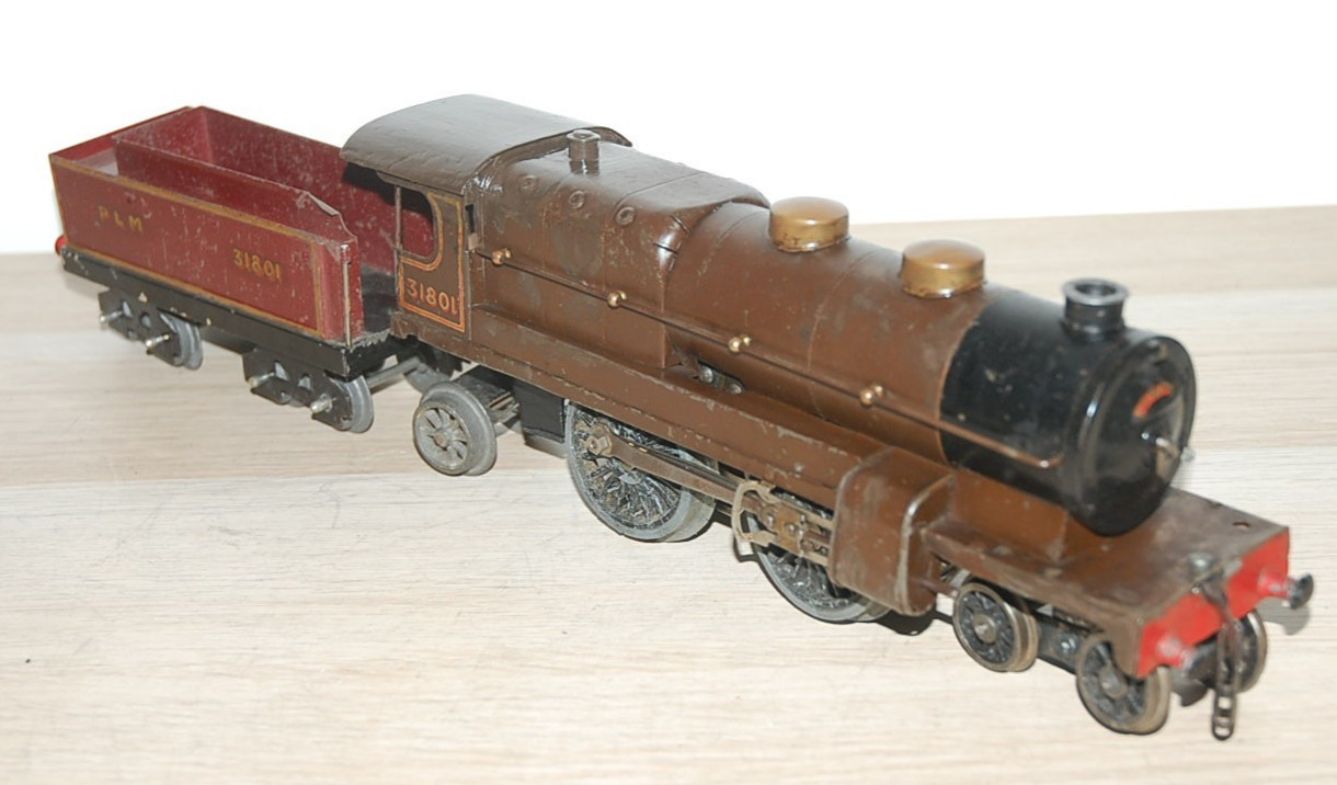 HORNBY O GAUGE CLOCKWORK ‘NORD’ LOCOMOTIVE AND TENDER IN BROWN LIVERY