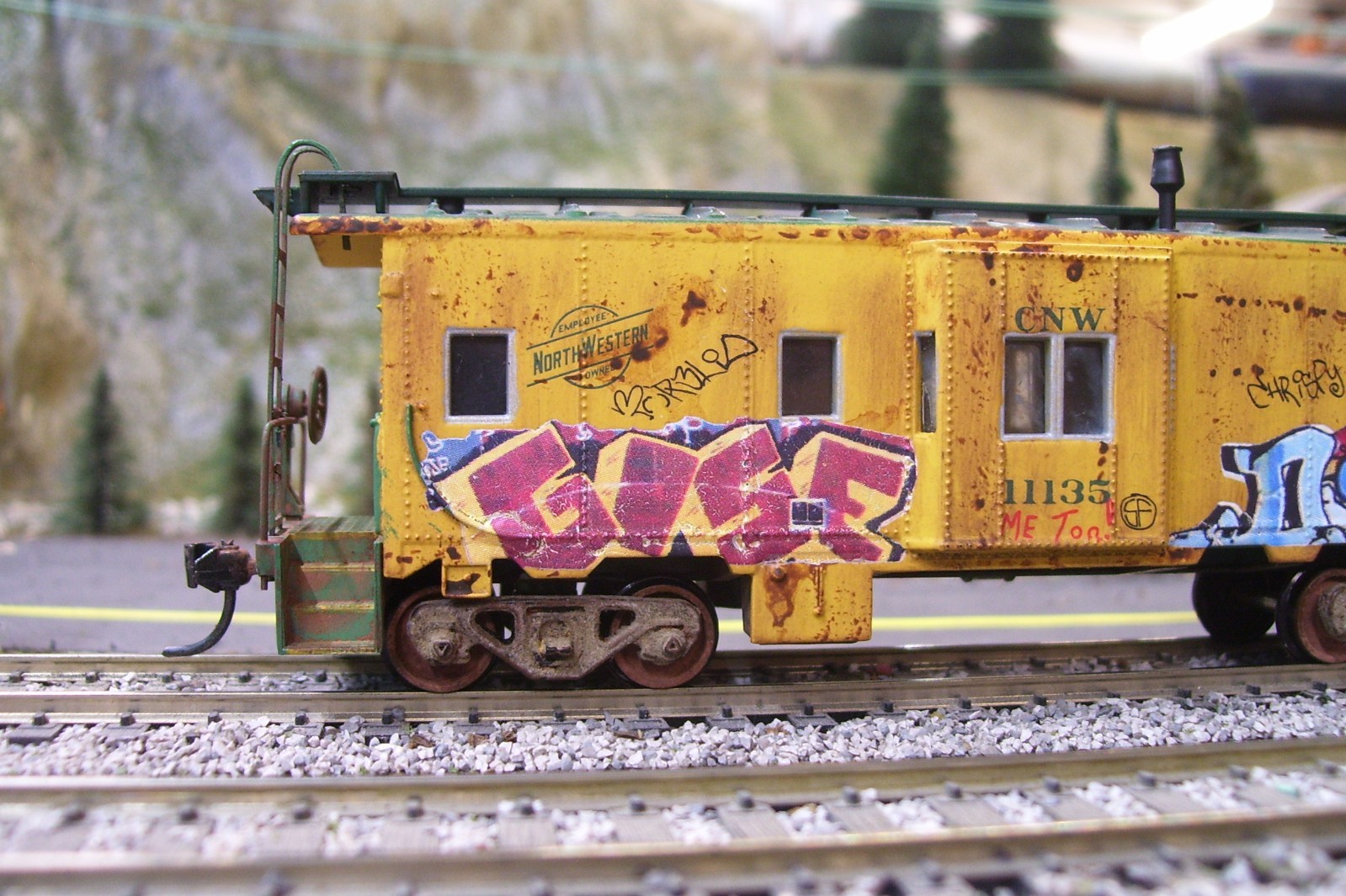 Custom Athearn Chicago &Northwestern bay window caboose.