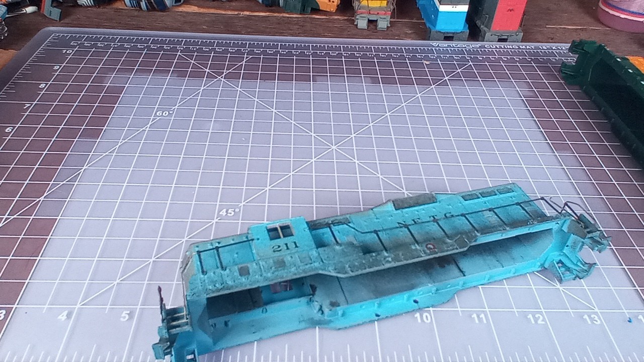 modified HO SHELL Rail Line NETG 211 blue GP9, railings inserts both ends BCK