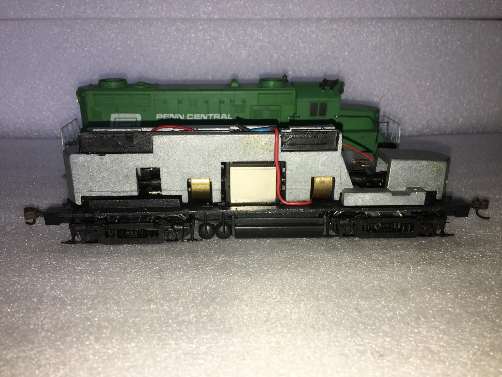 HO TYCO Penn Central GP20 shell with a Proto 2000 Chassis, Penn Central Caboose