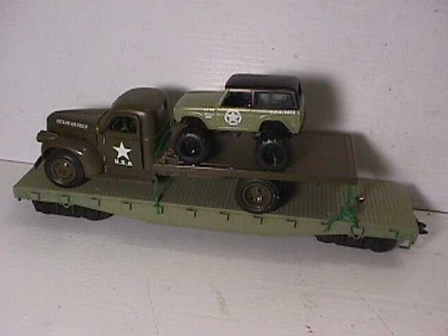 Marx O gauge home made Army train with new loads, plus Marx Army training Bldg.