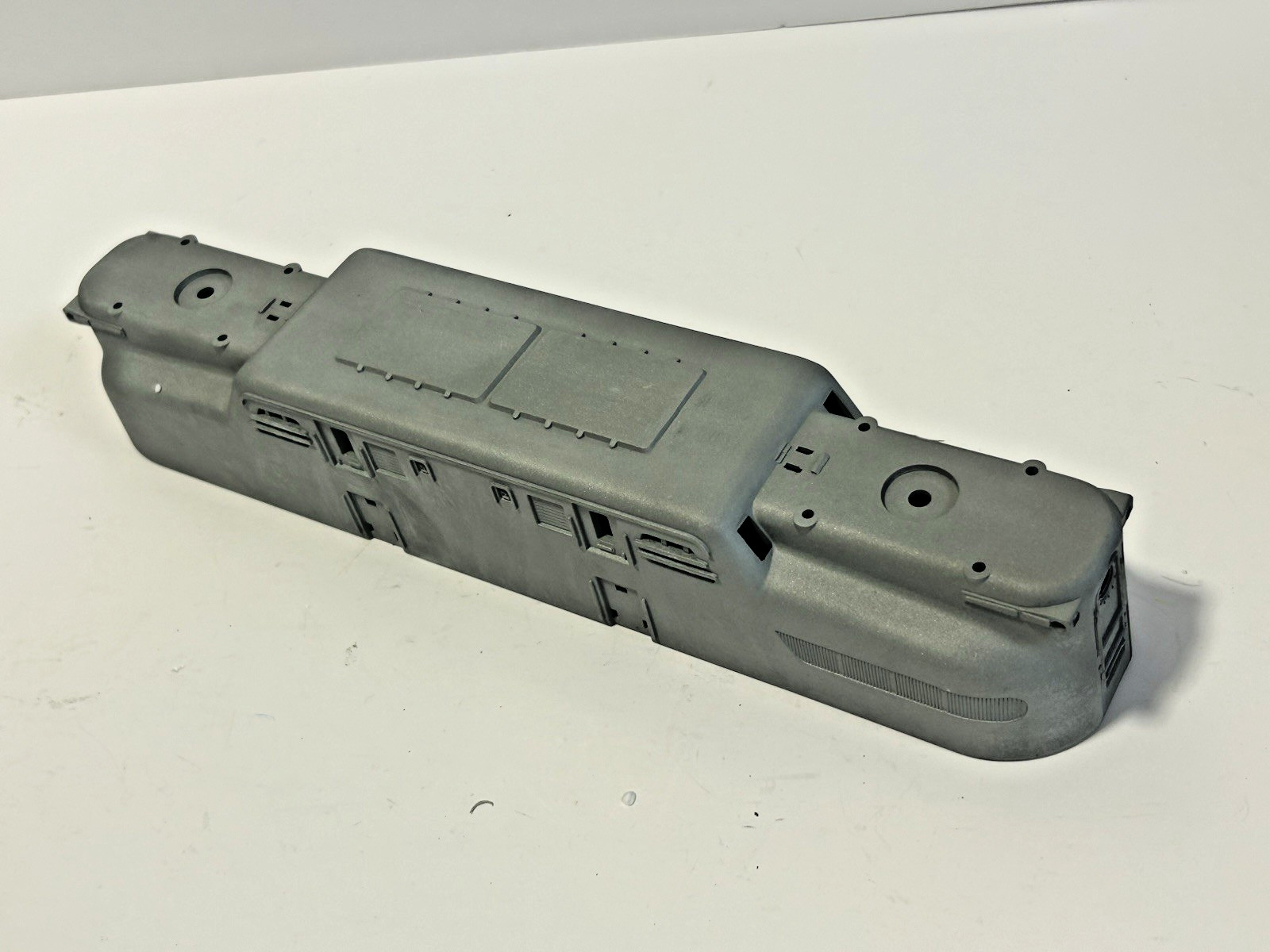 MTH Diecast Electric Locomotive GG-1 Only Shell, Frame, Tracks. Not painted.