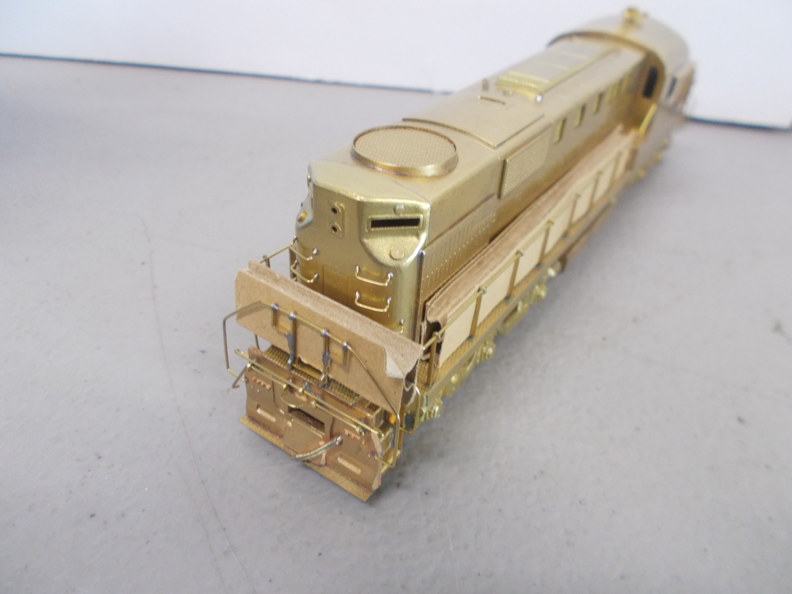 ALCO # D-124L ~ BRASS~ DL-702 POWERED LOCOMOTIVE ~NOS-RUNS GOOD~HO SCALE~LOT-B